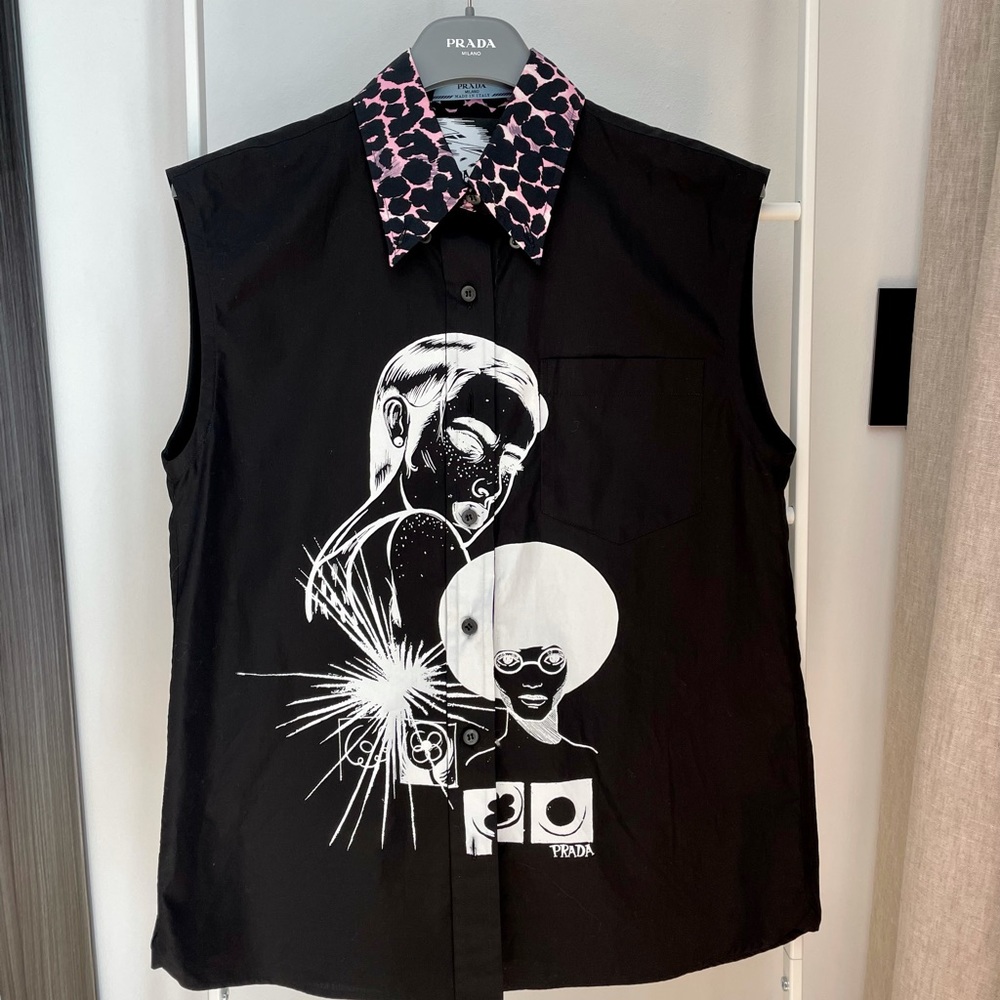 Prada sleeveless button down shirt.